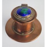 Jesson Birkett & Co. An Arts & Craft copper inkwell, of cylindrical form, the hinged lid with