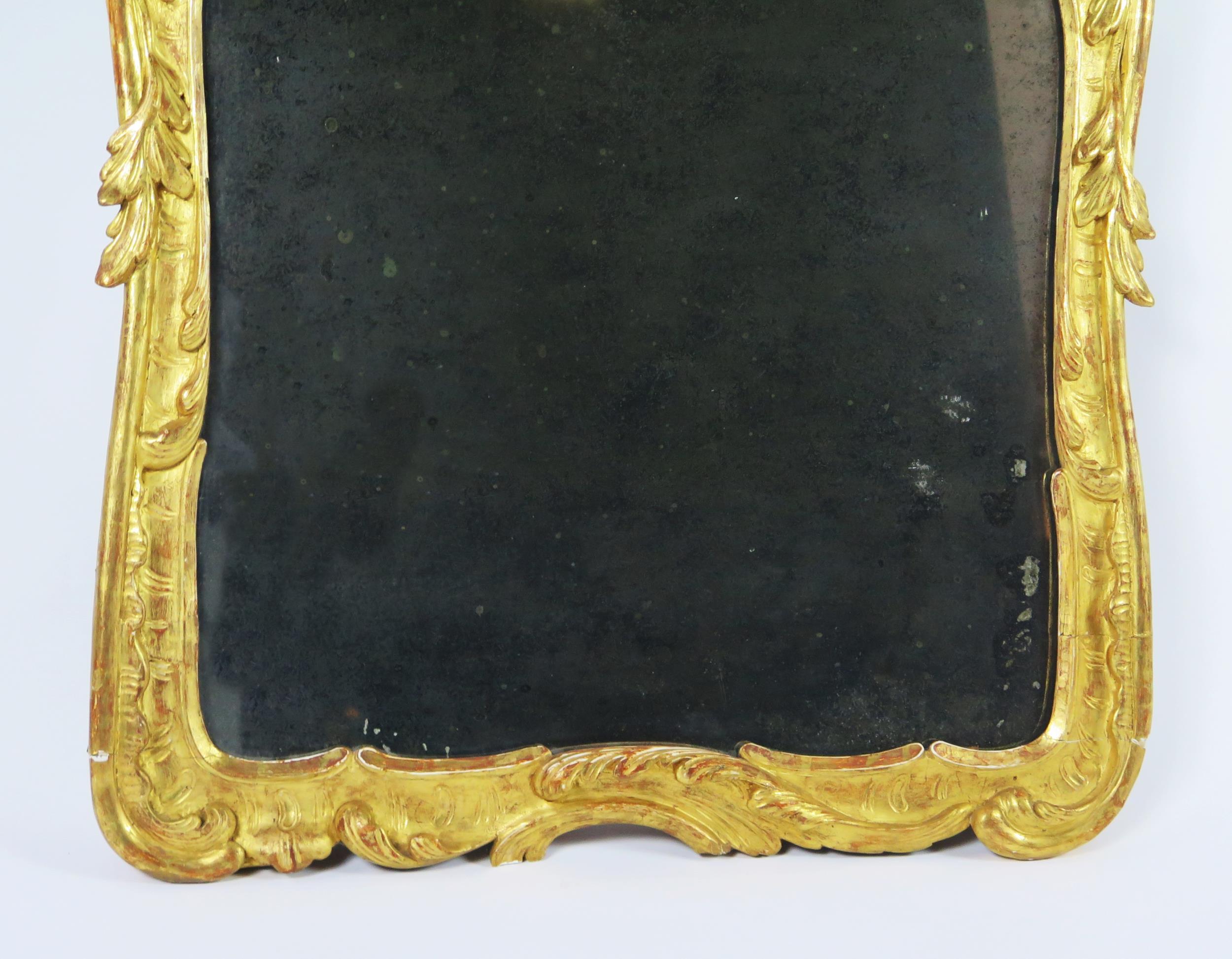 A late 18th century gilt and gesso pier glass, the rectangular mirror plate enclosed by floral and - Image 3 of 3