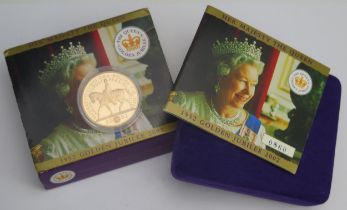 * An Elizabeth II 2002 22ct Gold £5 Coin in the original Royal Mint presentation case with COA no.