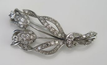 A Diamond Tulip Spray Brooch in a precious white metal setting, c. 3.54mm largest old cuts, 43.