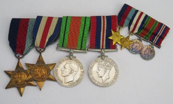 A World War II group of four medals, includes 1939-45 Star, France Germany Star, Defence and War