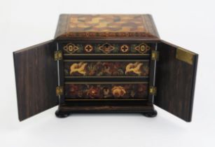 A Tunbridge ware table top cabinet, of rectangular outline, with tumbling cube decoration and Berlin