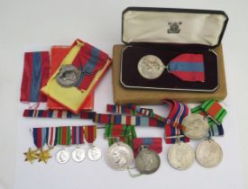 A collection of assorted medals including three Imperial service Medals, two Defence Medals, 1939-
