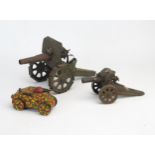 Military Tinplate Trio including Bing Artillery Gun, Marx Tank and another larger artillery gun