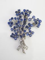 A Large Sapphire and Diamond Spray Brooch in a precious white metal setting, c. 3.5mm sapphires