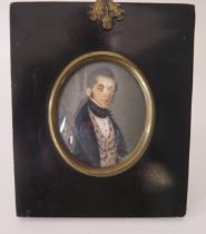 A 19th century French School miniature portrait on ivory of a gentleman, with black cravat,