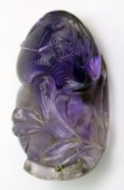 A Chinese carved amethyst pendant in the form of a gourd and bat, 4cm long.
