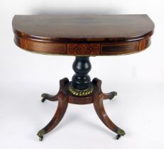 A 19th century rosewood card table, the hinged crossbanded top of D-shaped outline with baize