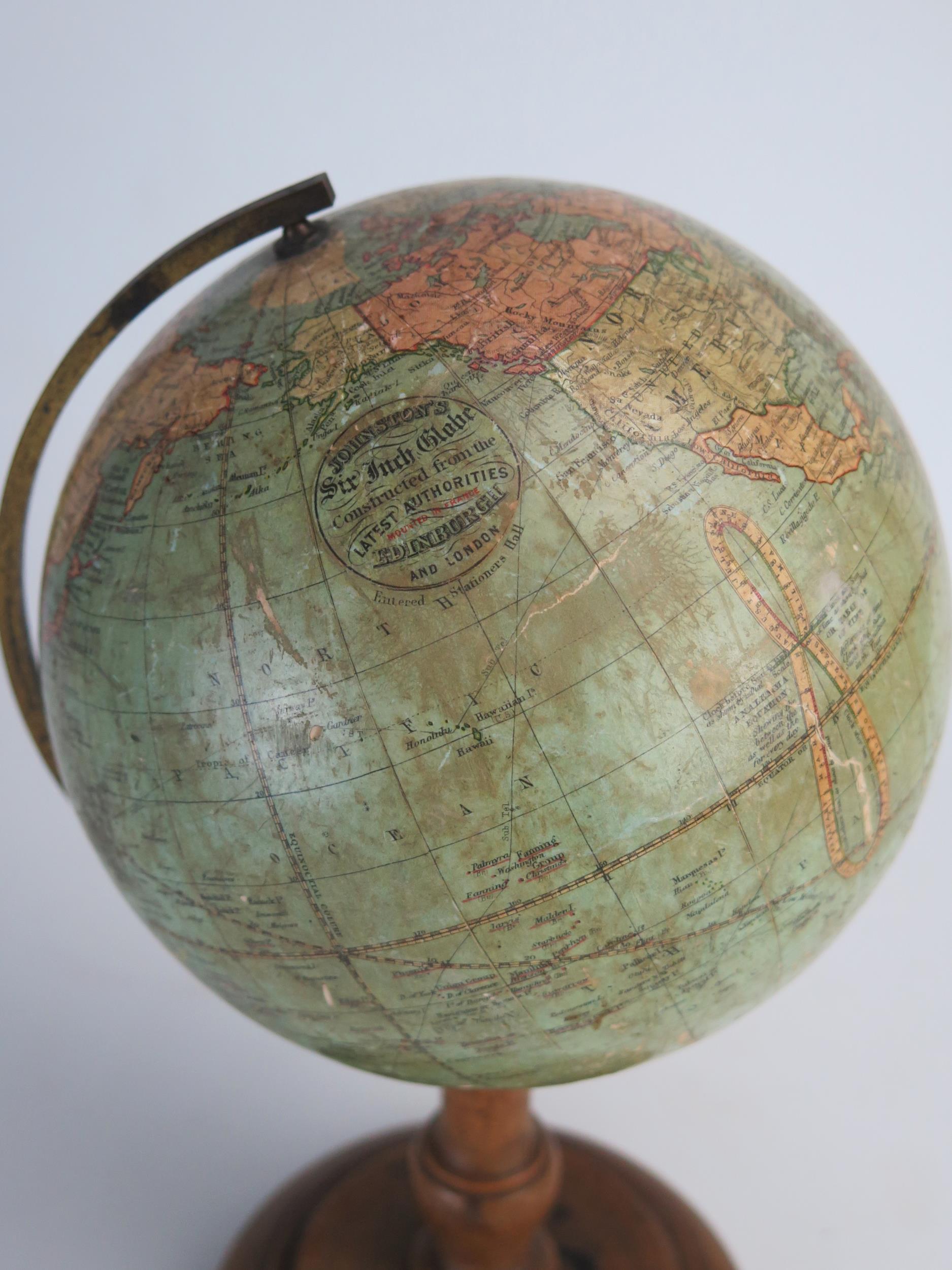 A Johnson's six inch terrestrial globe, on brass frame and turned wood circular base, overall height - Image 2 of 4