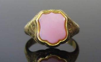 A Victorian 15ct Gold 'Poison' Ring, the hinged top set with agate and opening to reveal a foliate