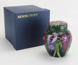 A Moorcroft pottery ginger jar and cover, with Anemone pattern decoration, dated 2002, 16cm high,