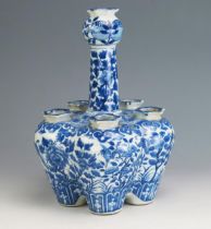 A Chinese Qing porcelain blue and white tulip vase, of lobed form decorated with birds,