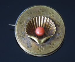 An Antique Precious Yellow Metal Circular Brooch with a central scallop shell set with a coral '