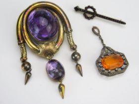 A Victorian Pinchbeck and Foil Backed Cabochon Amethyst Locket Back Brooch, 76.6mm drop, 19th