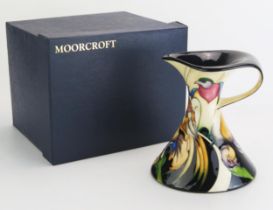 A Moorcroft pottery jug with Fleur De Luce decoration designed by Emma Bossons, dated 2007, 19cm