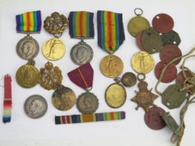 A collection of World War I War and Victory Medals 1914-15 Star, identity tags, ribbons, RAF cap