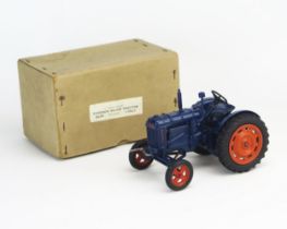 Chad Valley Clockwork Die-cast Clorkwork 9235 Fordson Major Tractor in dark blue with orange hubs