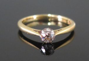 A Modern 18ct Gold and Diamond Solitaire Ring platinum claw set c. 4.87mm old cut, size R.5, stamped