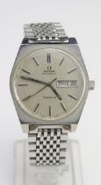 An OMEGA Gent's Steel Cased Automatic Wristwatch, Ref: 166.0120 on a flat beads of rice bracelet,