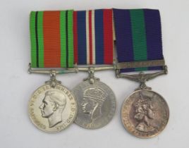 A World War II medal group includes Defence Medal, War Medal and General Service Medal with Cyprus