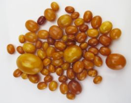 A Quantity of Amber Graduated Loose Beads, largest 31x22.6mm, 58.79g