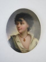 A KPM style oval porcelain plaque, depicting a young gypsy boy with locket around his throat, 8.