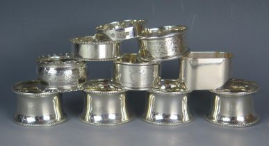 A mixed collection of ten silver napkin rings, various makers and dates, total weight of silver