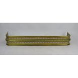 A 19th century brass fire kerb of rectangular outline, with pierced banded and rope twist