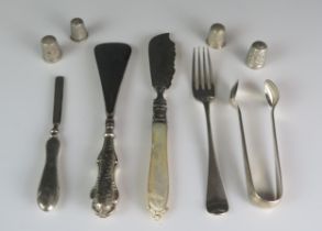 A silver and mother-of-pearl handled butter knife, silver handled shoe horn, pair silver sugar