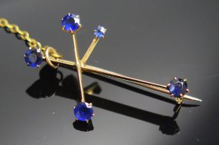 A 9ct Gold and Blue Stone 'North Star' Brooch, 37.2mm long, stamped 9CT, 2.91g, early 20th century