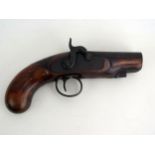 A mid 19th century percussion 3/4ins bore pistol, with 9cm fully stocked barrel, walnut grip,