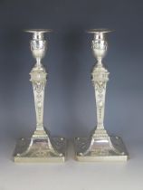 A pair of late Victorian silver candlesticks, maker Hawksworth, Eyre & Co Ltd, Sheffield, 1897, with