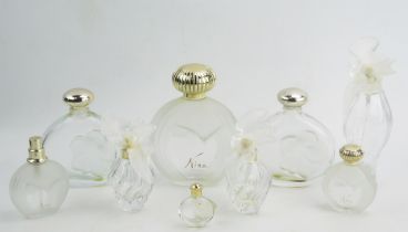 A Selection of Nina Ricci Scent Bottles including various signed Lalique