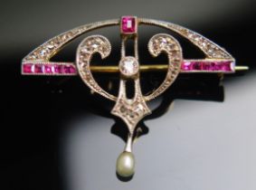 A 14ct Gold, Ruby and Diamond Brooch with a single pearl or cultured pearl drop on a hinged