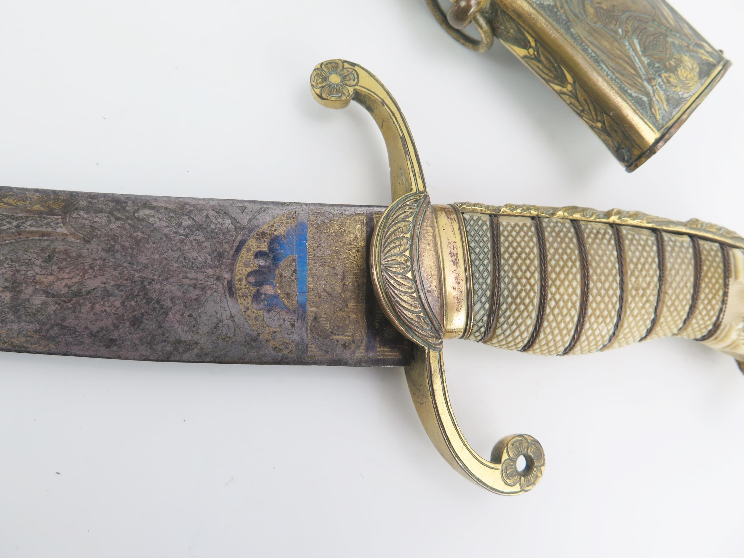 An early 19th century continental cutlass, with 44cm curved and etched blade, with gilt brass - Image 15 of 15