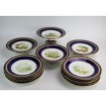 A 19th Century Fifteen Piece Porcelain Desert Set decorated with country landscapes