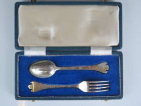 An Elizabeth II matched silver christening set, various makers Sheffield, 1967/73, with trefid spoon