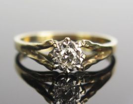 A 9ct Gold and Diamond Solitaire Ring, 3mm illusion set brilliant round cut, size N, hallmarked, 1.