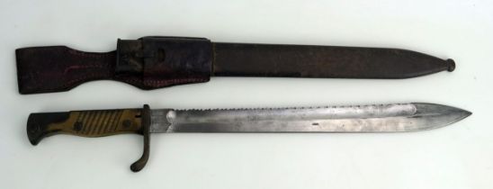 A German Pioneer bayonet, model 98/05, with 17cm saw-back blade, with turned down quillion ribbed