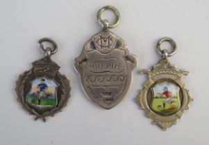 Three assorted silver football medals, various makers and dates. 26gms, 0.9ozs