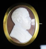 An Antique Shell Cameo Brooch decorated with the bust of a bearded gentleman in profile and in a