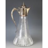 An Elizabeth II clear glass and silver mounted claret jug, maker C J Vander Ltd, Sheffield, 2000, of