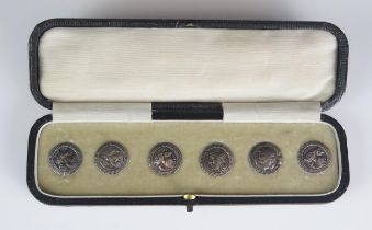 A set of six silver ancient coin style buttons, contained in a fitted, case.