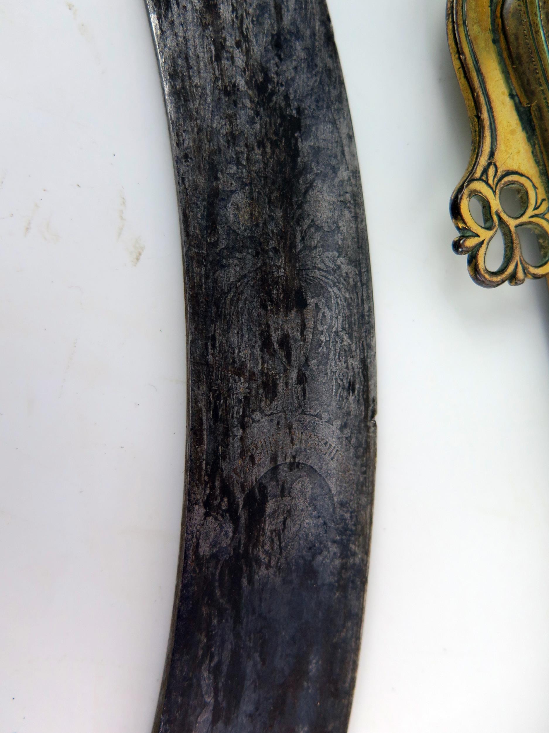 An early 19th century continental cutlass, with 44cm curved and etched blade, with gilt brass - Image 14 of 15