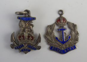 Two silver Royal Navy pendants with fouled anchor and enamel decoration.