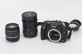 Canon EOS 350D camera body with Canon EFS 18-55mm and Vivitar Series 1 28-70mm lenses