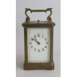 A French Brass Repeating Carriage Clock, 15cm high. Winds, balance turning and repeat button