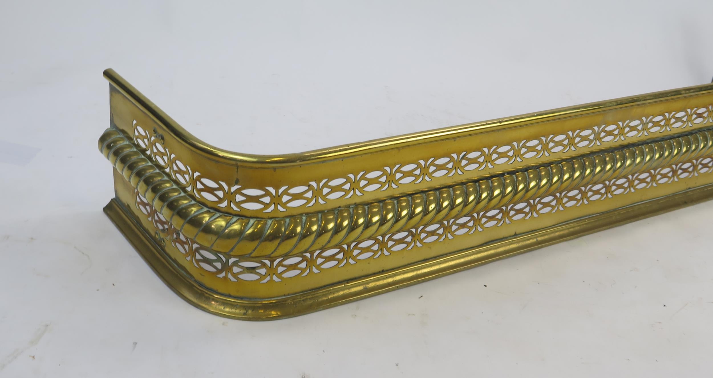 A 19th century brass fire kerb of rectangular outline, with pierced banded and rope twist - Image 2 of 2