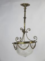 A 19th century gilt metal and glass hall lantern, with circular ceiling rose and knopped stem,