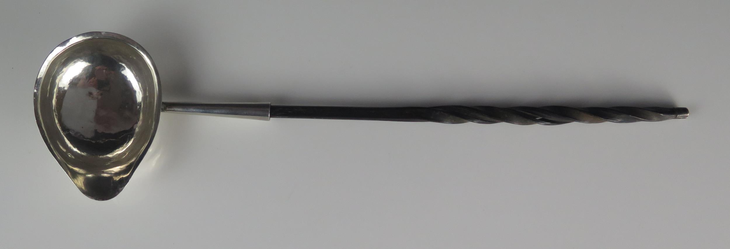 A George III silver toddy ladle, makers mark worn possibly T.S, London, 1779, monogrammed, mounted